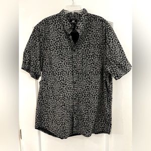H & M short sleeve shirt with gray and black print. Size large.